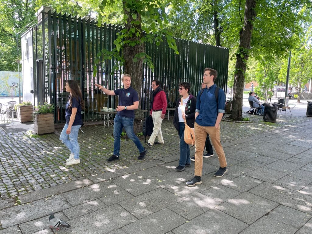 Group walking together in a sunny park