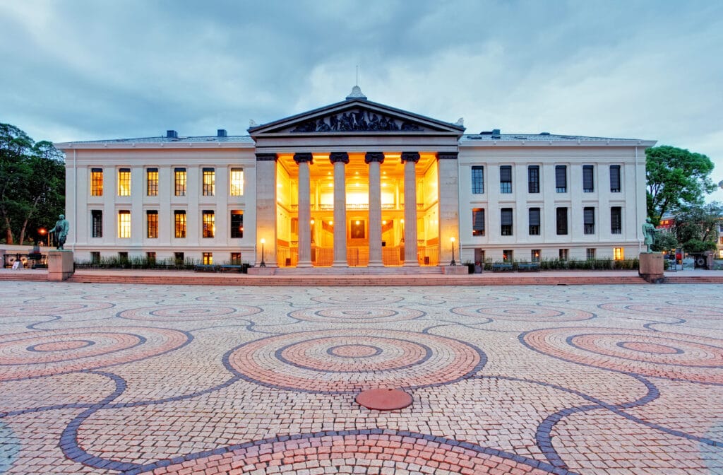 Historic university building with illuminated columns