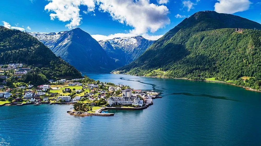 Scenic fjord village surrounded by mountains and water