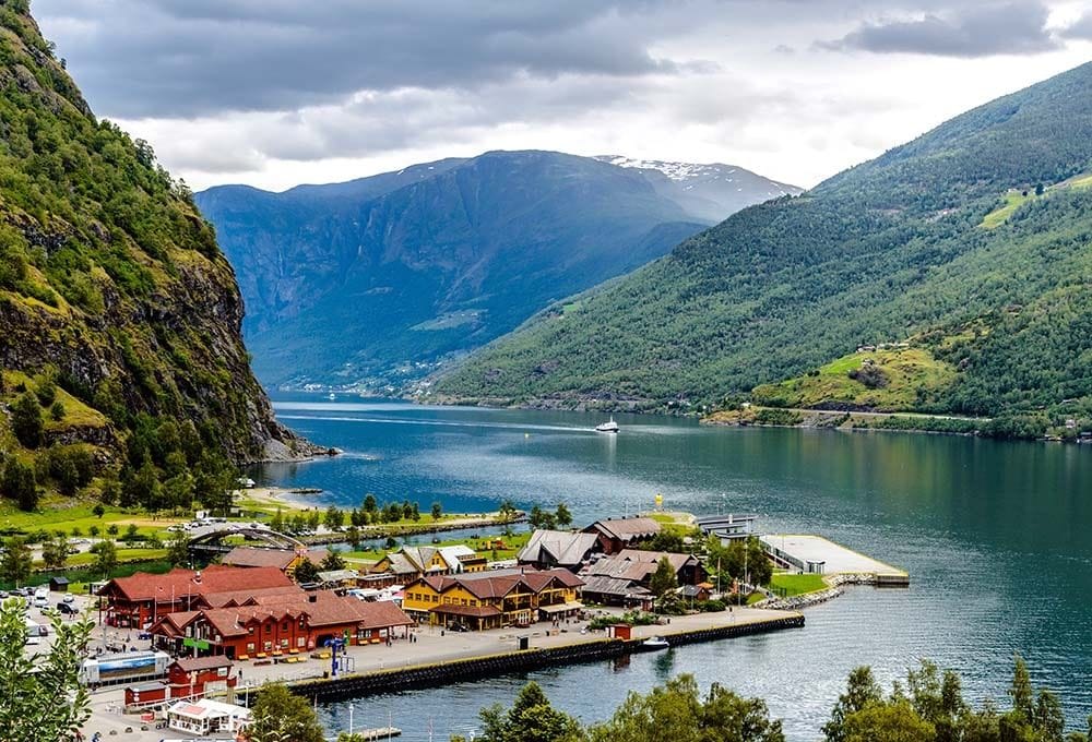 Scenic fjord village surrounded by lush green mountains
